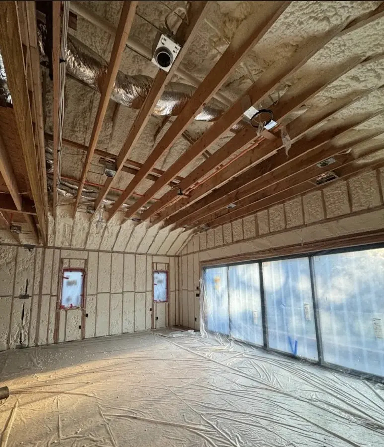 Interior walls and ceiling insulated with spray foam during new construction in Emporia